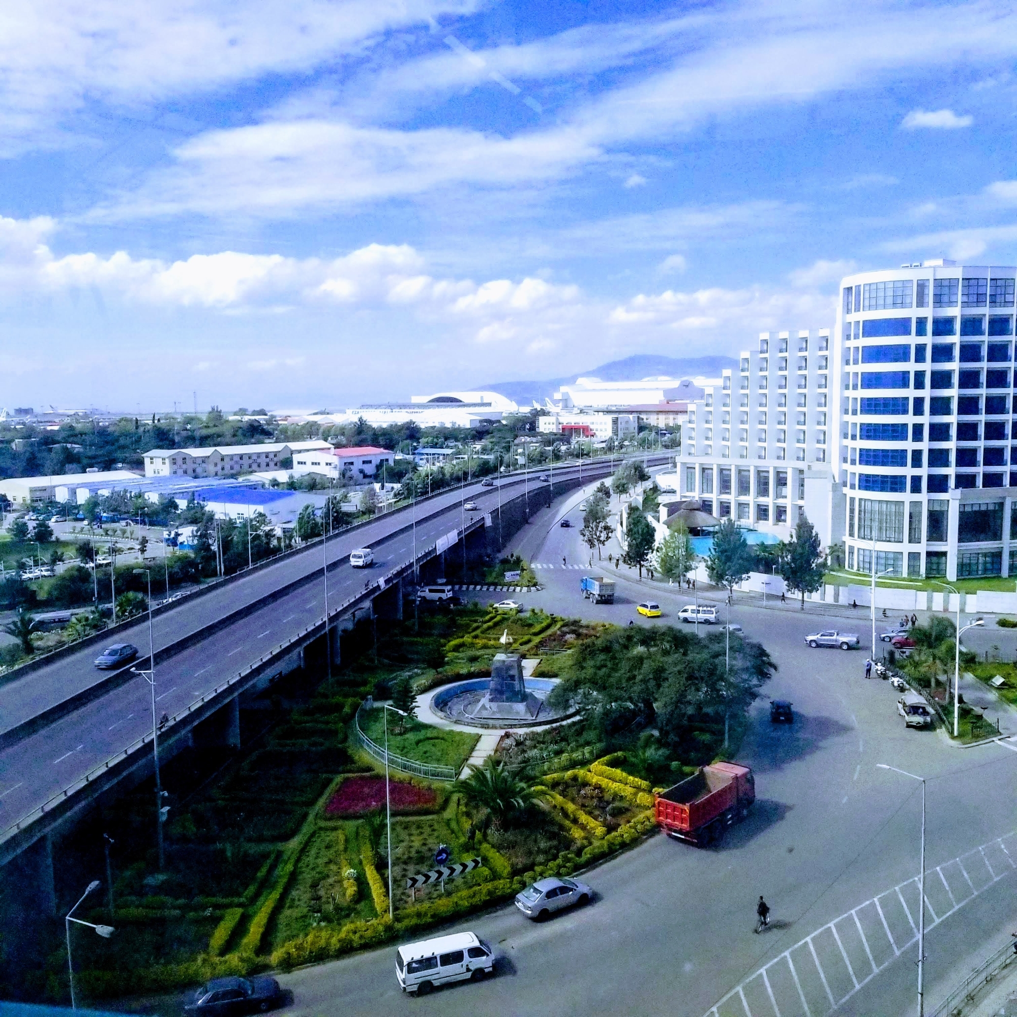 Addis Ababa skyline: Highway, park and skyscrapers